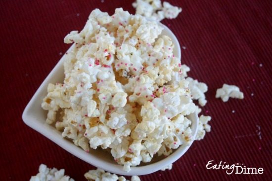 This Valentine's Day White Chocolate Popcorn Recipe is easy to make and sure to be a hit! It's the perfect Valentine's Day Treat to make that is so tasty.