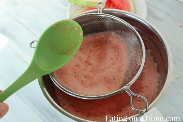 Straining the watermelon mixture