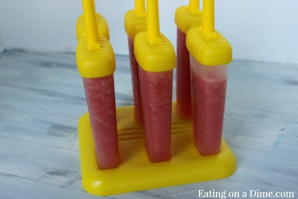 Watermelon mixture in popsicle molds