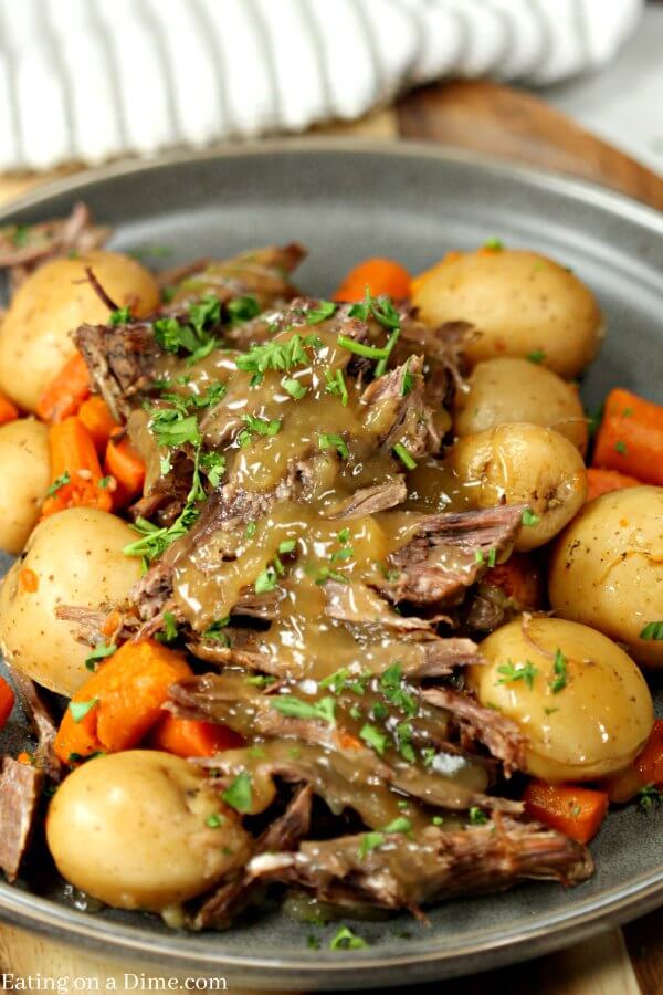 This Instant Pot Roast Dinner Recipe is amazing! It is truly the best Pressure Cooker Pot Roast Dinner recipe. The gravy is so delicious. You will see why it's the Best Pot Roast Recipe for the Instant Pot. The veggies are packed with flavor! Yum! 