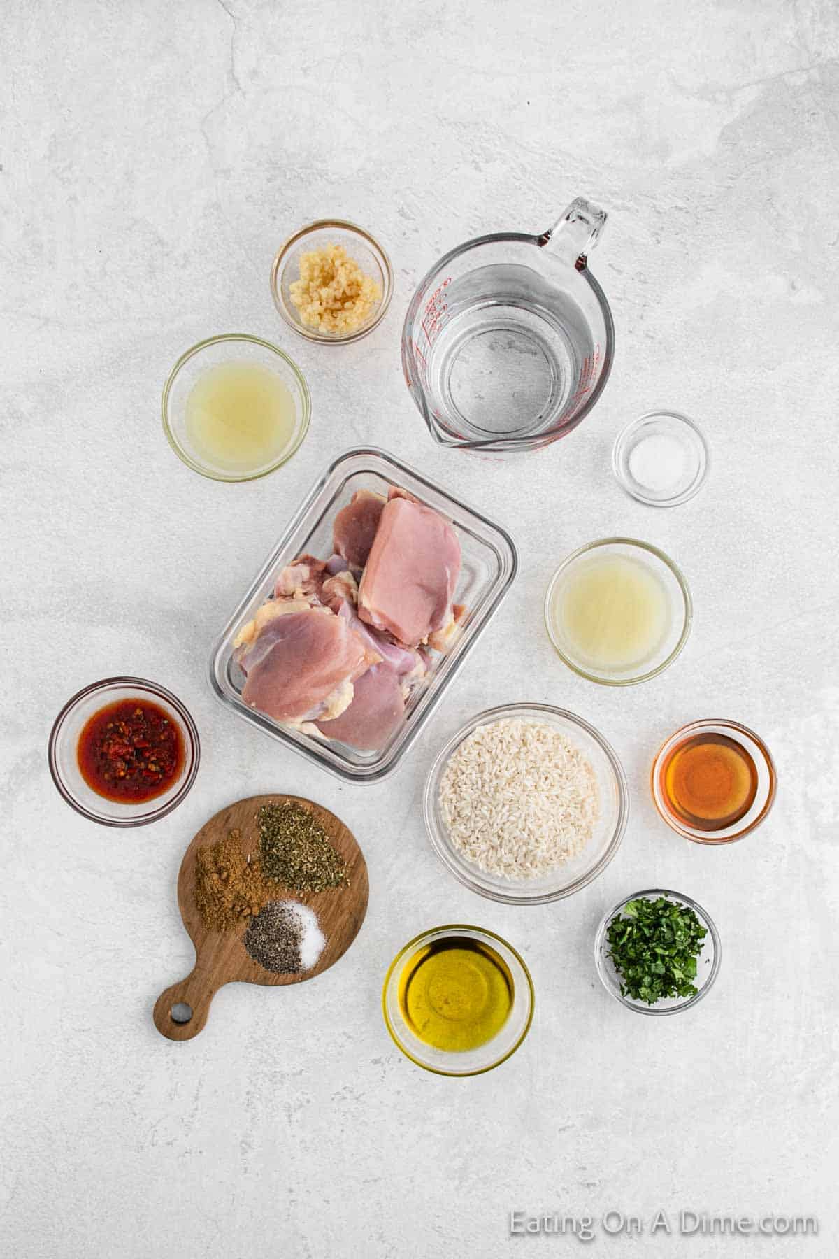 Ingredients - Chicken Thighs, olive oil, chipotle peppers, lime juice, honey, garlic, cumin, oregano, salt, pepper, white rice, cilantro, lime juice