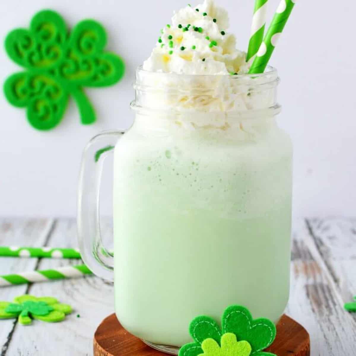 You can make Mcdonald's Shamrock Shake Recipe for kids at home! We love copycat recipes & this shamrock shake recipe is easy. This McDonalds milkshake will be a hit. #eatingonadime #shakerecipes #shamrockshake