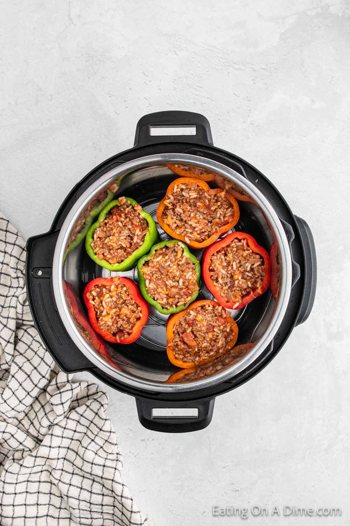 Bell Peppers stuffed with ground beef mixture in a instant pot