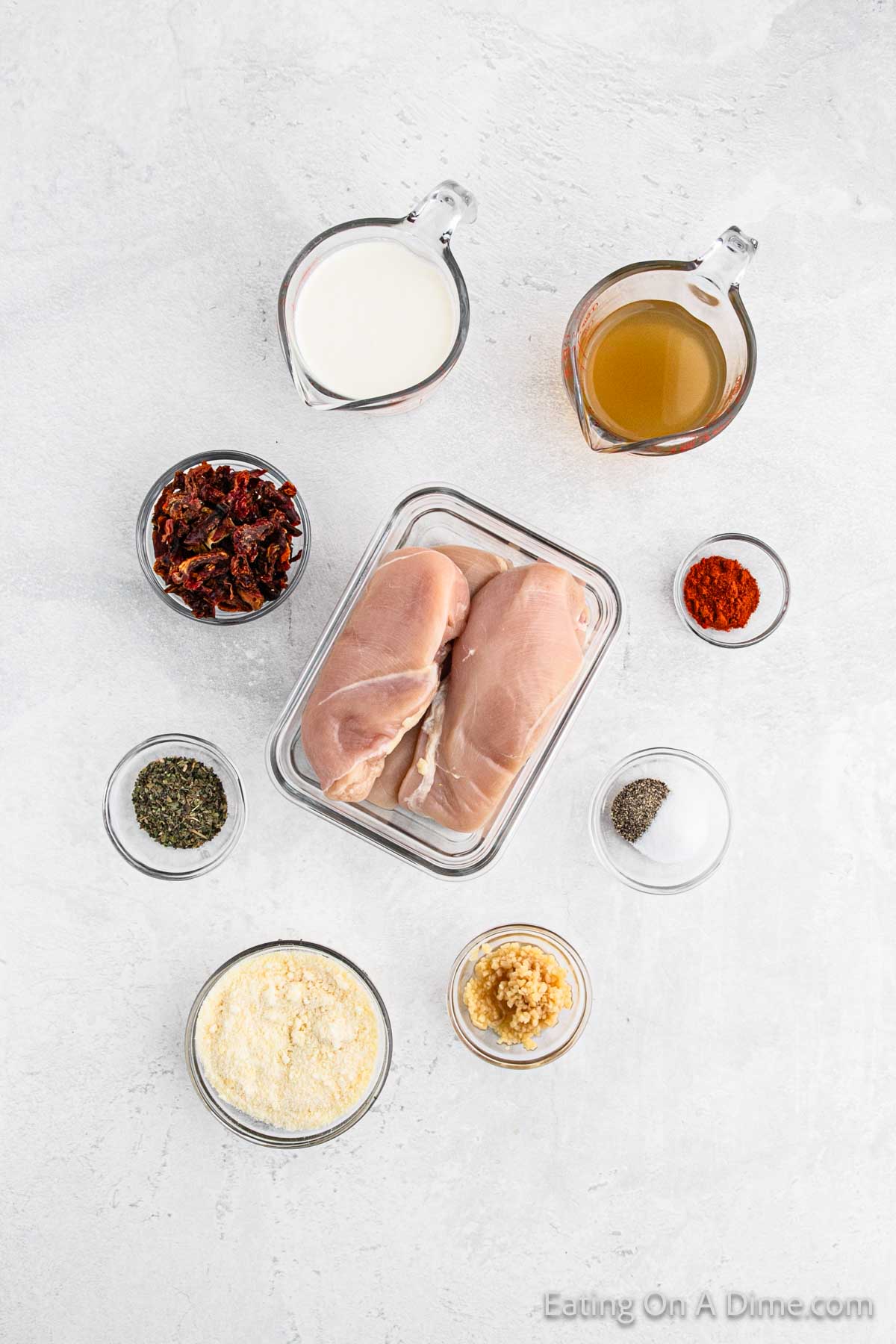 Ingredients - Chicken breasts, sun dried tomatoes, minced garlic, salt, pepper, Italian seasoning, paprika, chicken broth, heavy cream, parmesan cheese