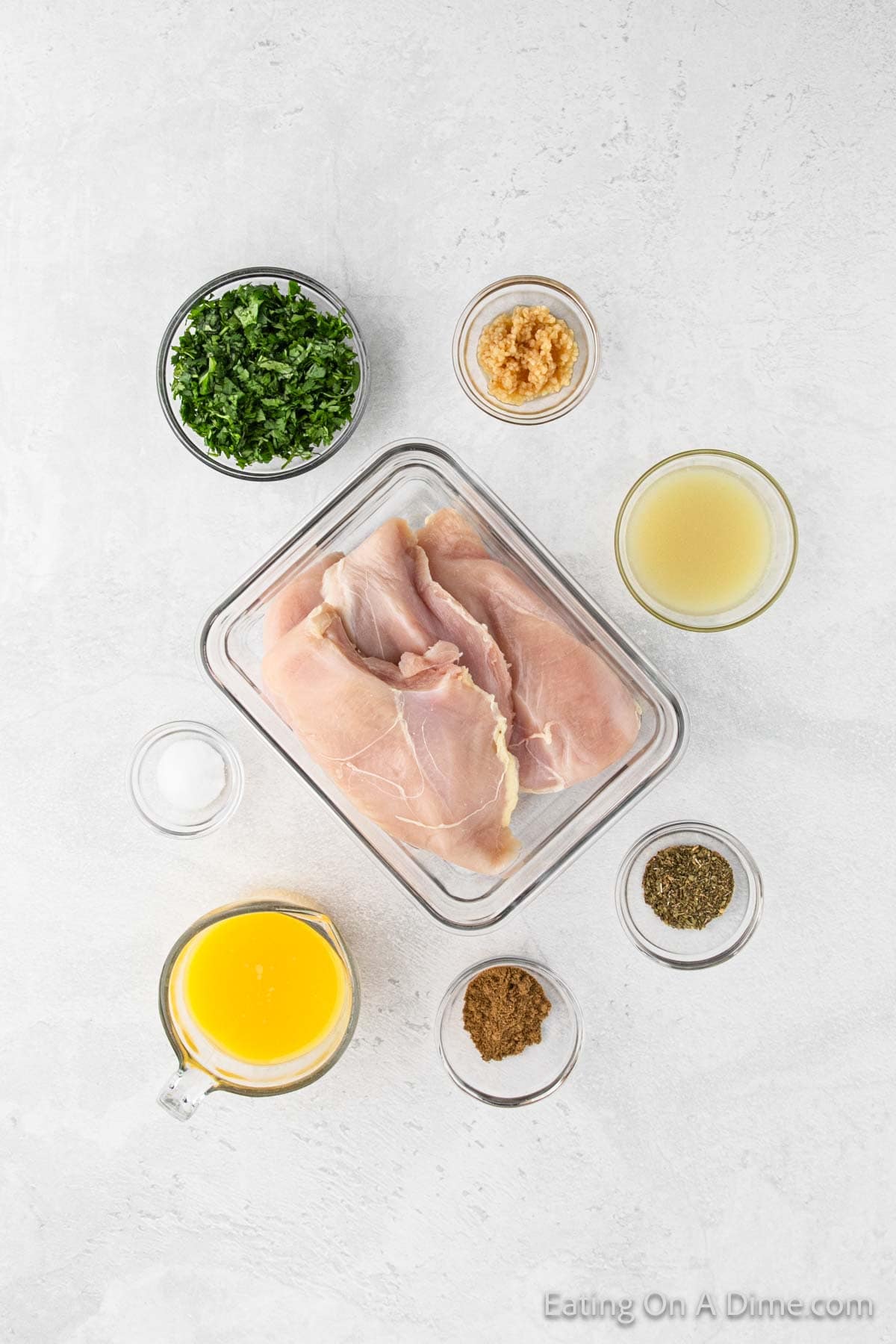 Ingredients - Boneless chicken, orange juice, lime, cilantro, minced garlic, oregano, cumin, salt