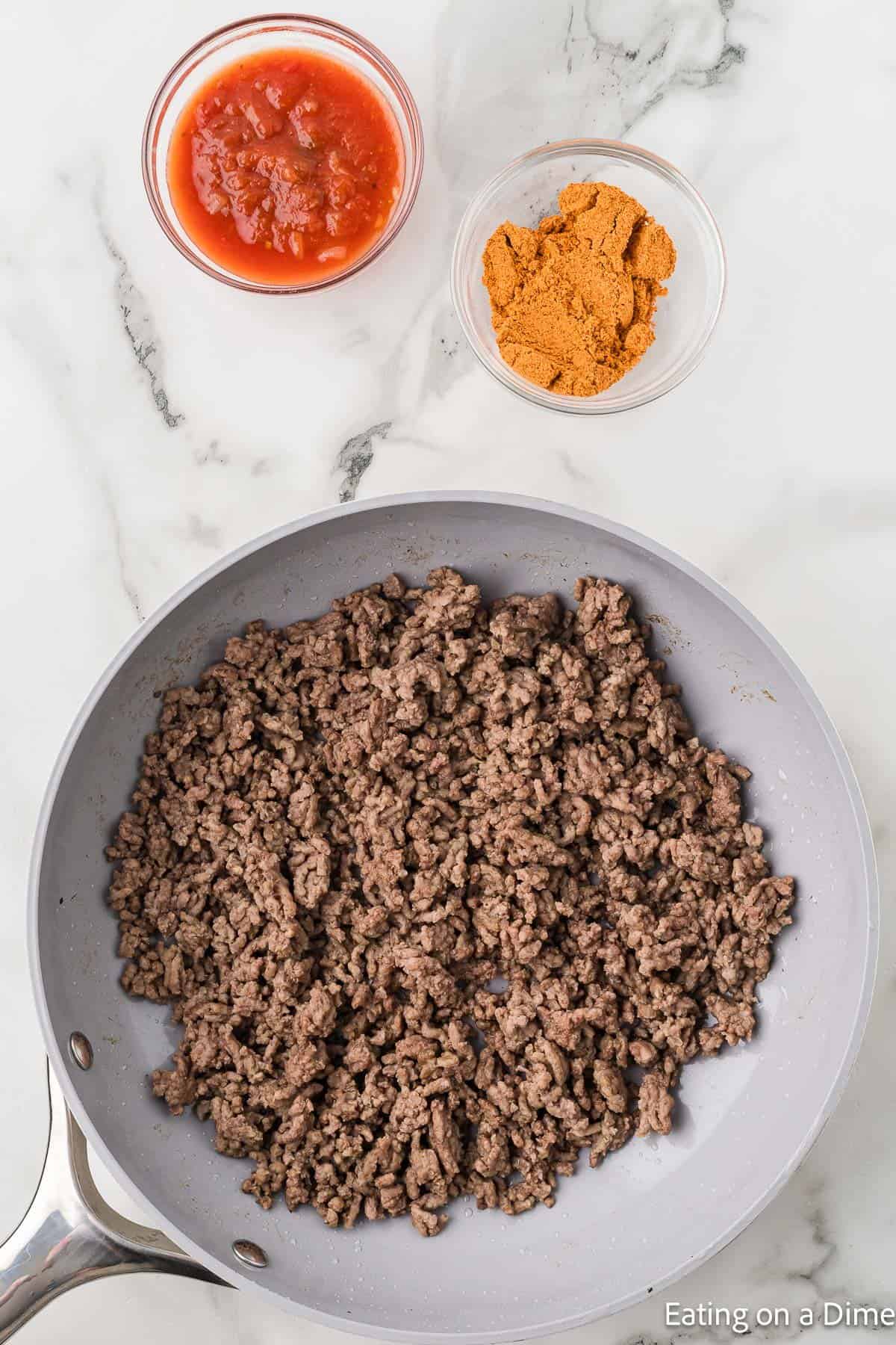 Cooked ground beef in a large skillet