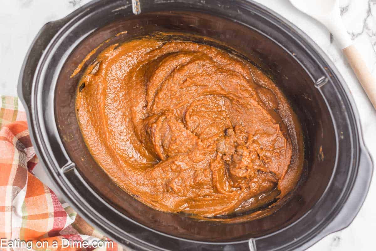 Cooked pumpkin butter in a slow cooker