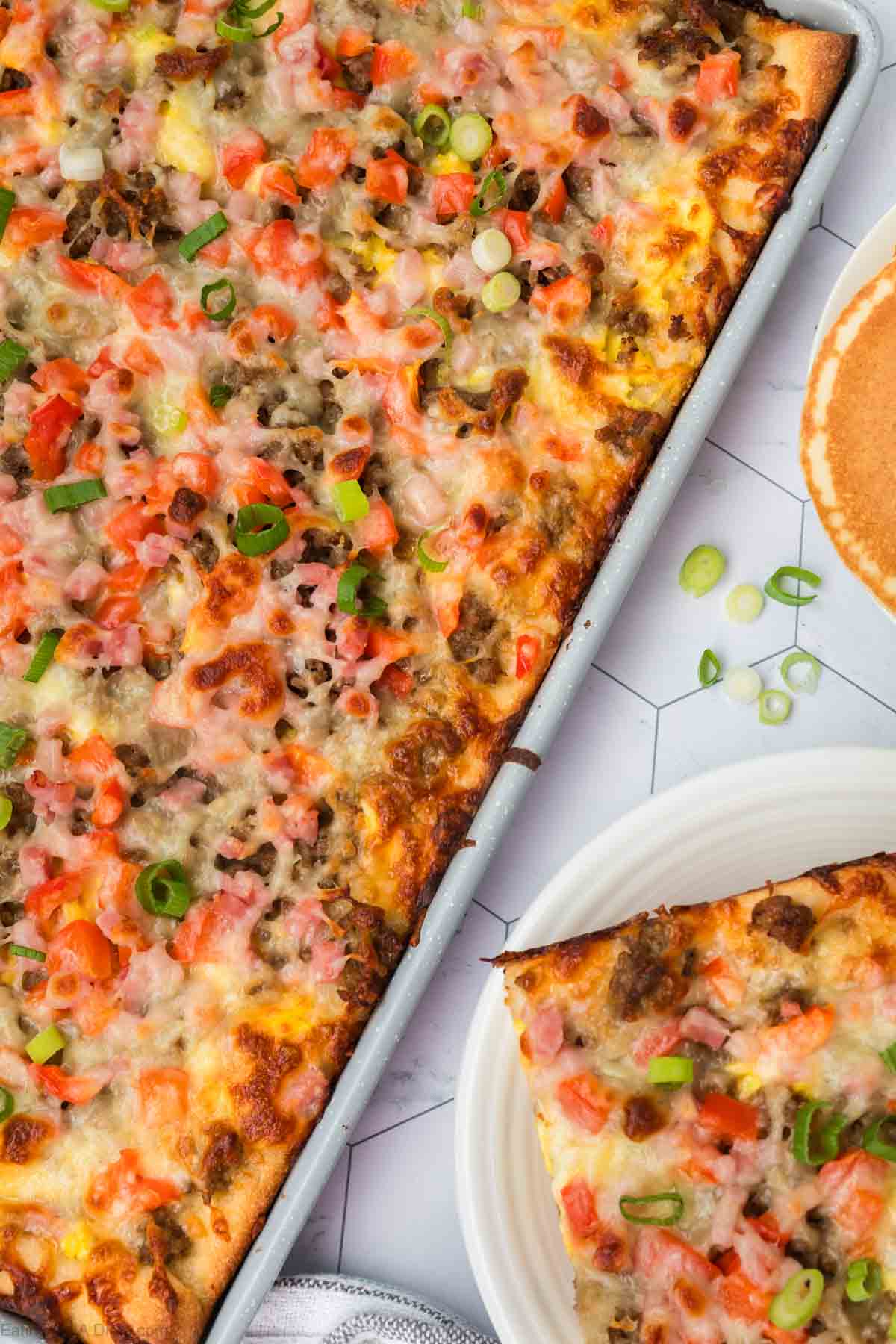 Breakfast pizza in a baking sheet