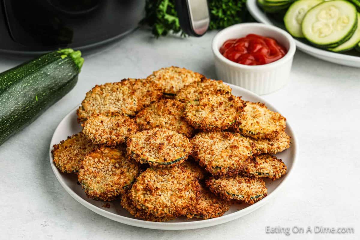 Zucchini Chips stacked on a plate