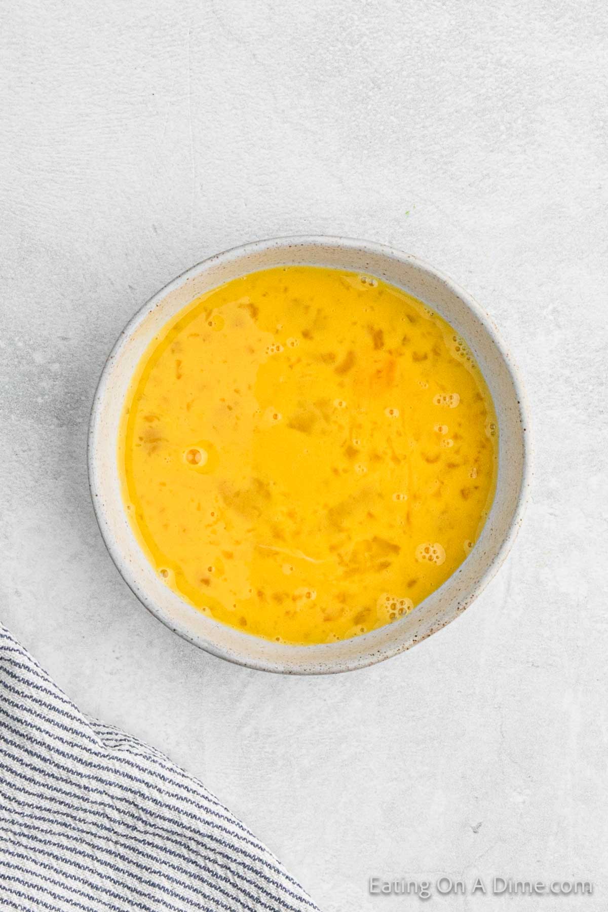 Scrambled egg yolks in a bowl