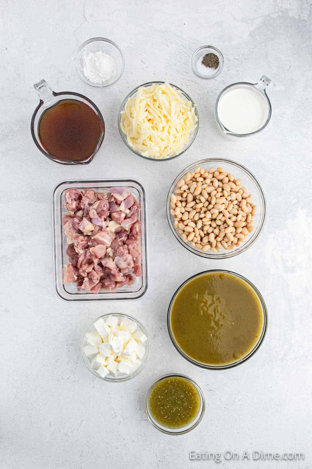 Ingredients - Chicken Thighs, white beans, green enchilada sauce, salsa verde, salt, pepper, heavy whipping cream, monterey jack cheese, cream cheese, chicken broth, cornstarch, avocado, cilantro, sour cream