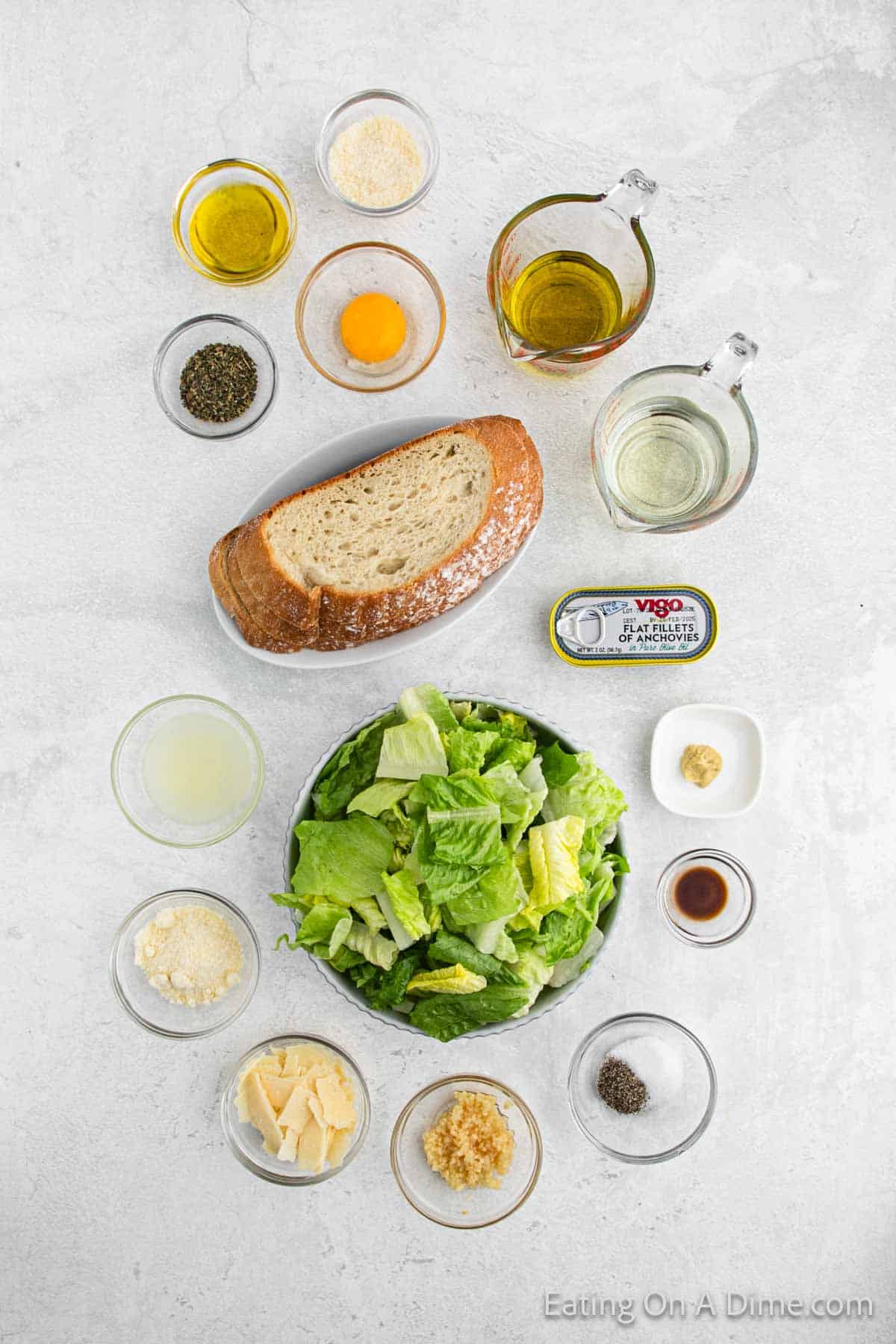 Ingredients - Bread Slices, olive oil, Italian Seasoning, Parmesan Cheese, anchovy filets, garlic, Worcestershire Sauce, egg, lemon, Dijon Mustard, olive oil, vegetable oil, parmesan cheese, salt, pepper