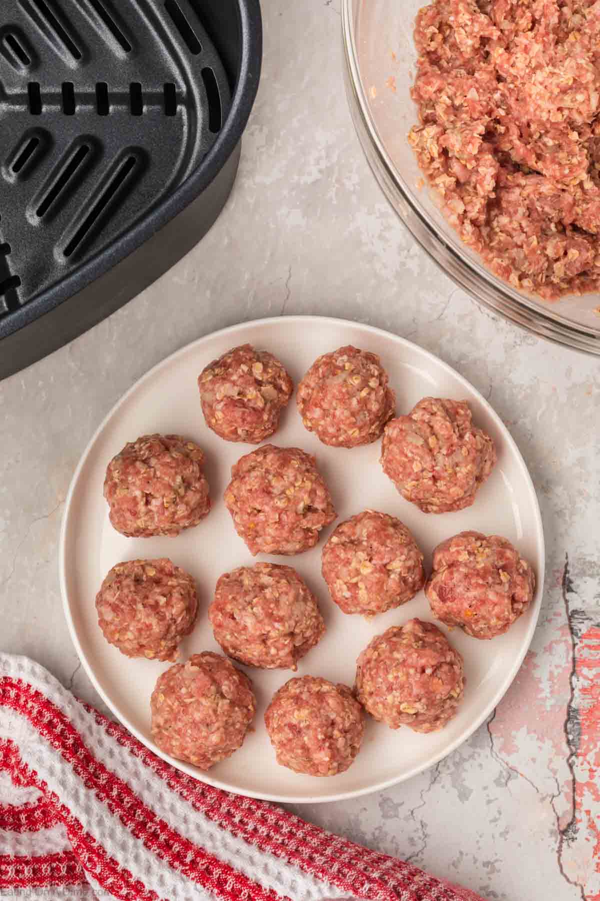 Uncooked meatballs on a plate