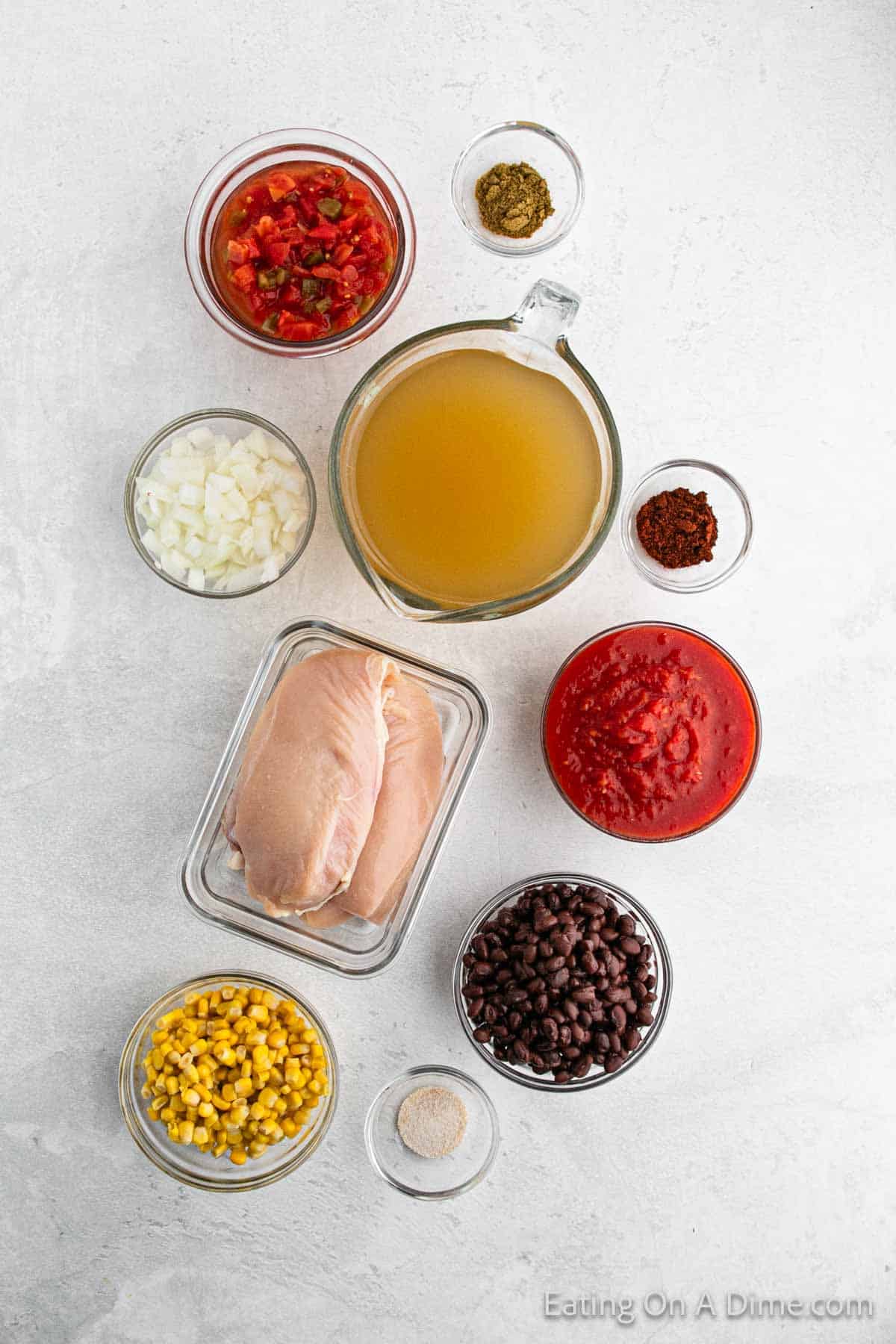 Ingredients - Chicken Breast, black beans, diced tomatoes, crushed tomatoes, chopped onion, corn, chicken broth, chili powder, cumin, garlic salt, tortilla strips, cheddar cheese, cilantro