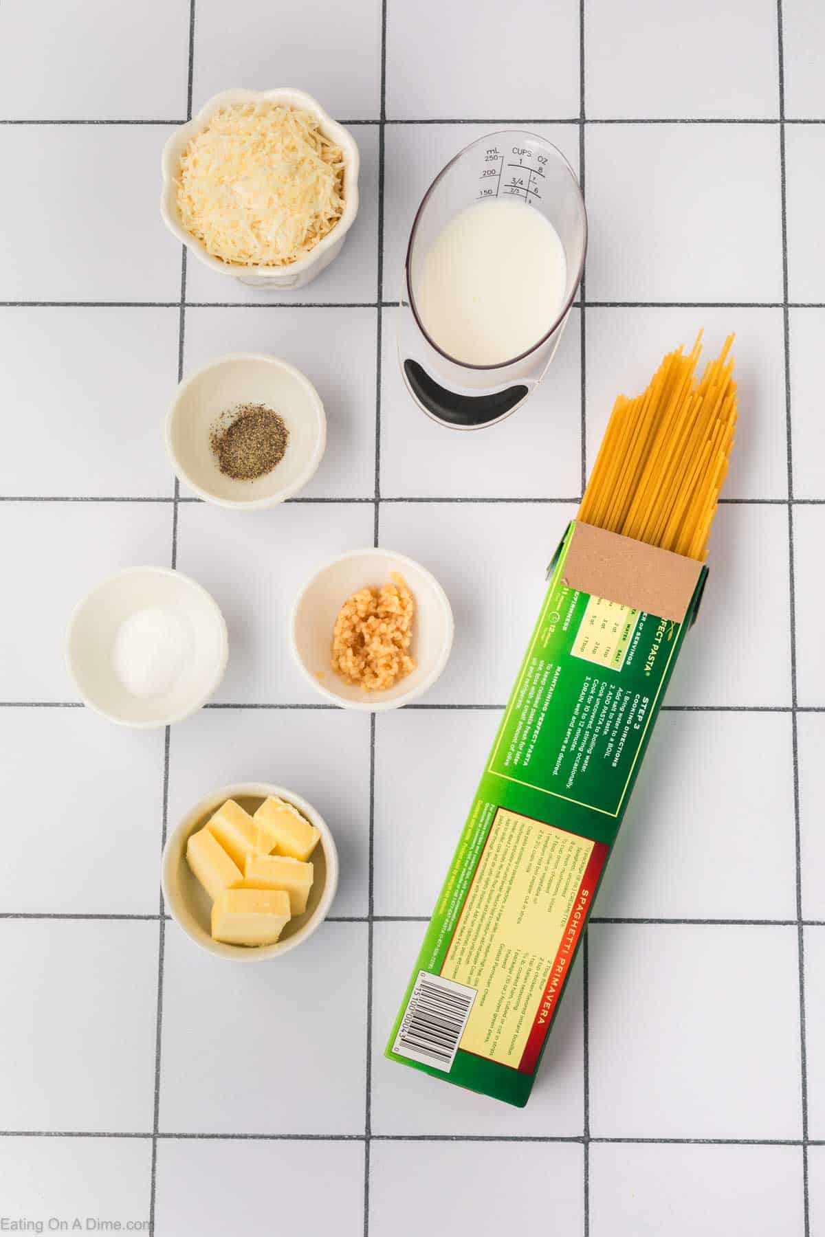 Ingredients - Spaghetti Noodles, butter, milk, garlic, salt, pepper, parmesan cheese