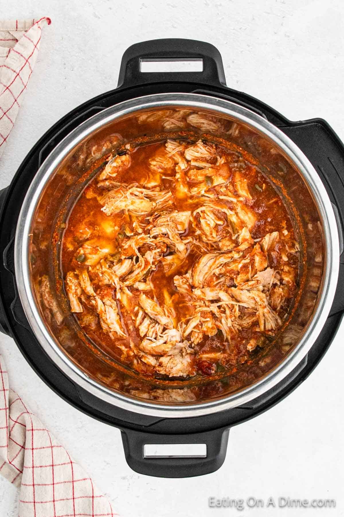 Shredded chicken in the tacos mixture in the instant pot