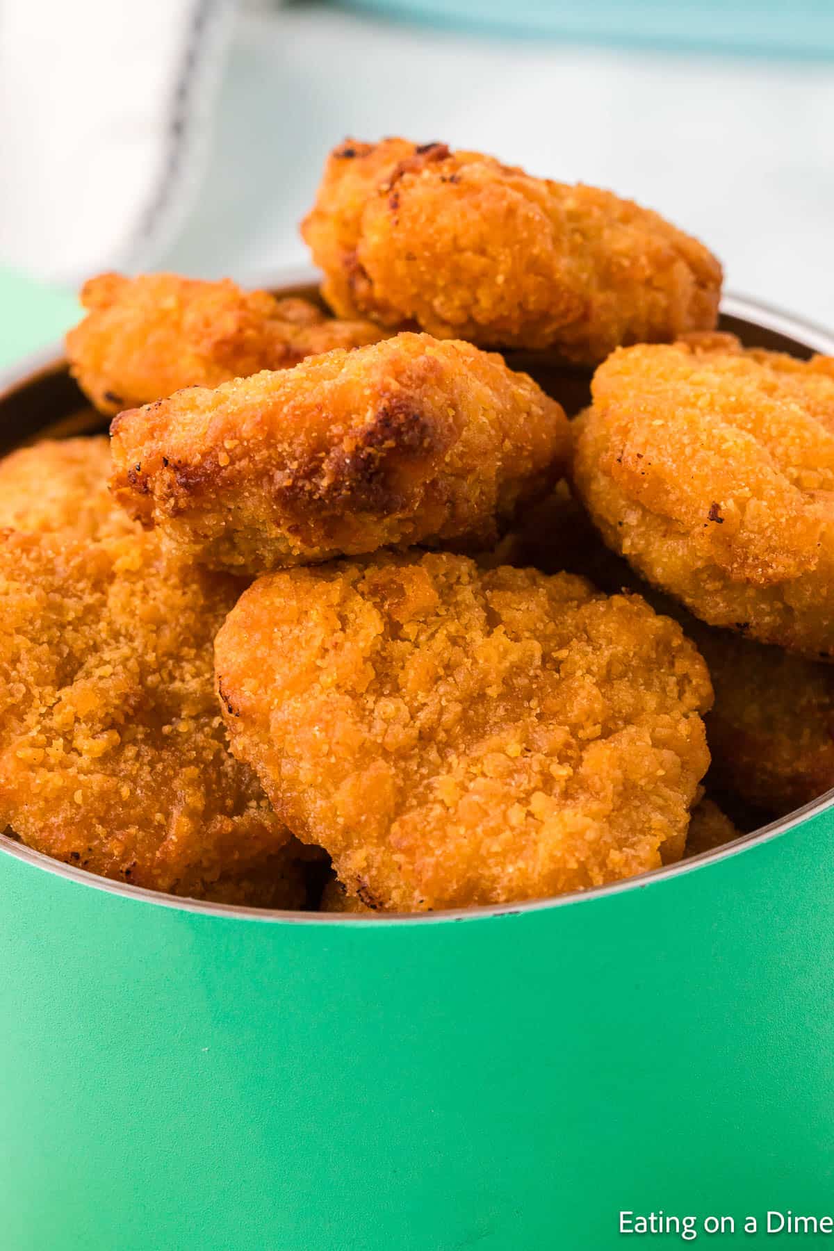 Chicken Nuggets stacked in a container