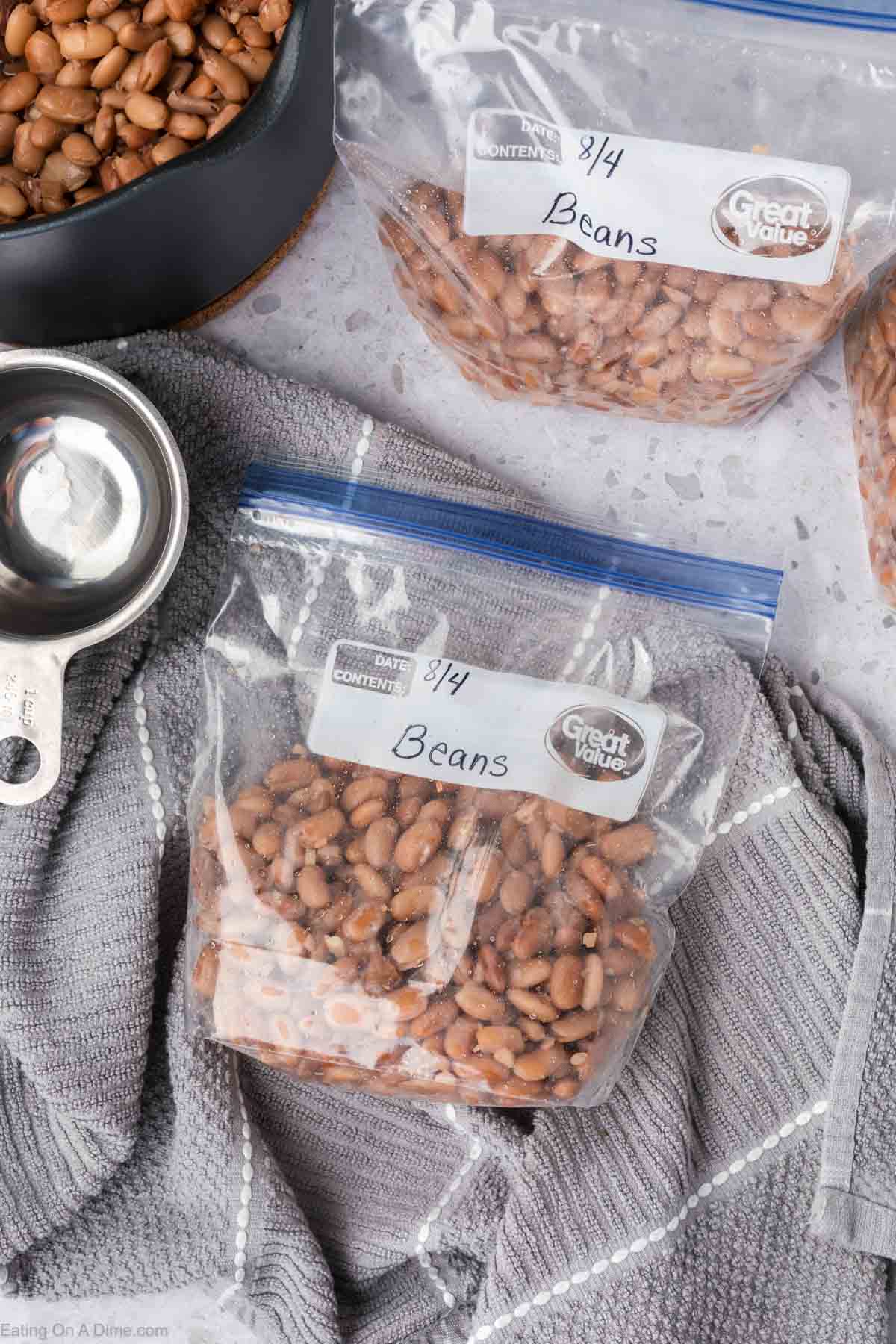 Cooked pinto beans in a zip lock freezer bag