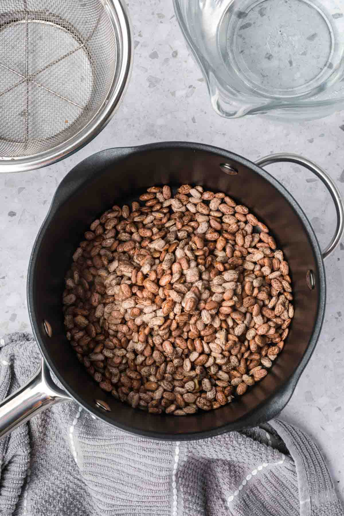 Uncooked beans in a large pot