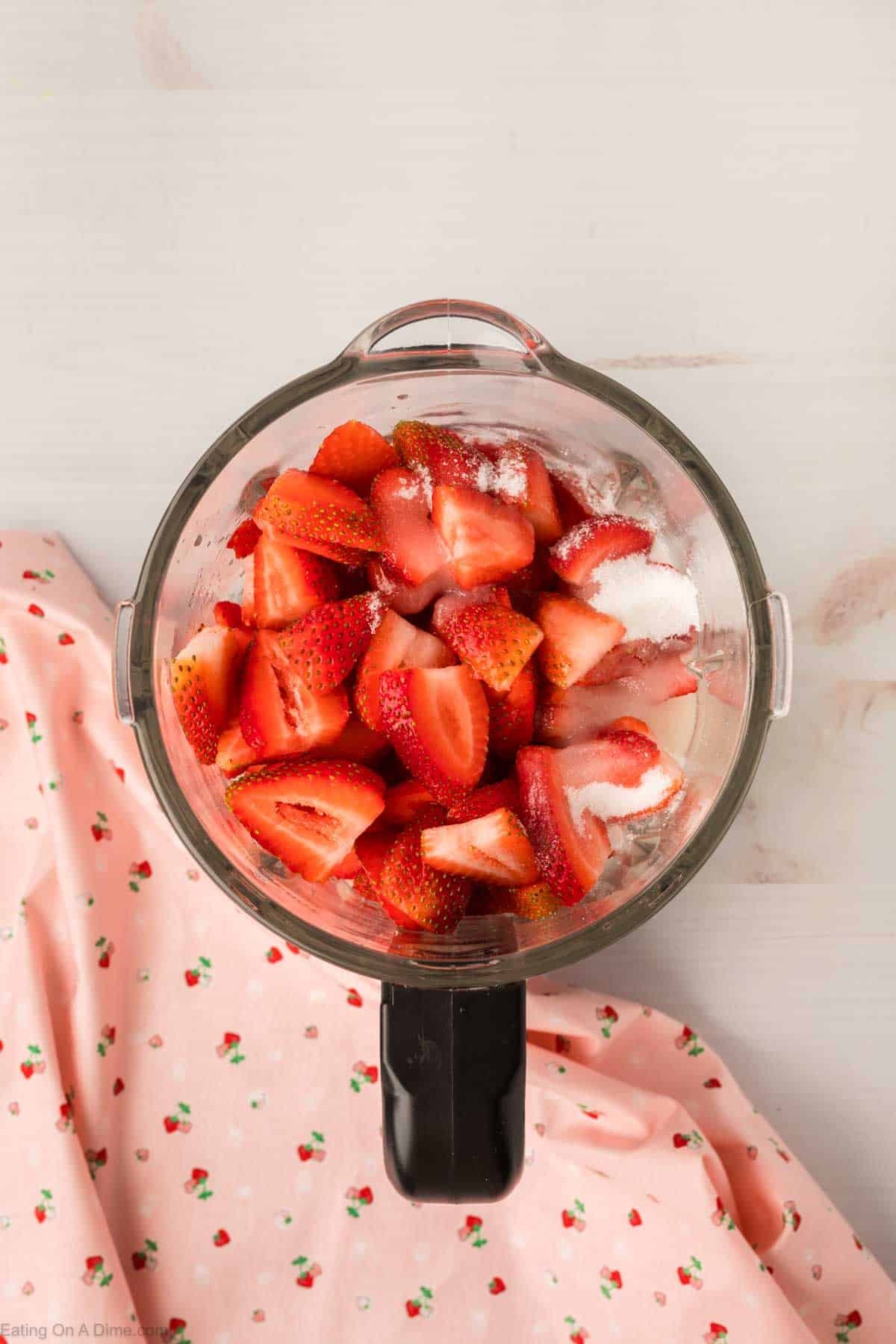 Slice Fresh Strawberries with Sugar in the blender