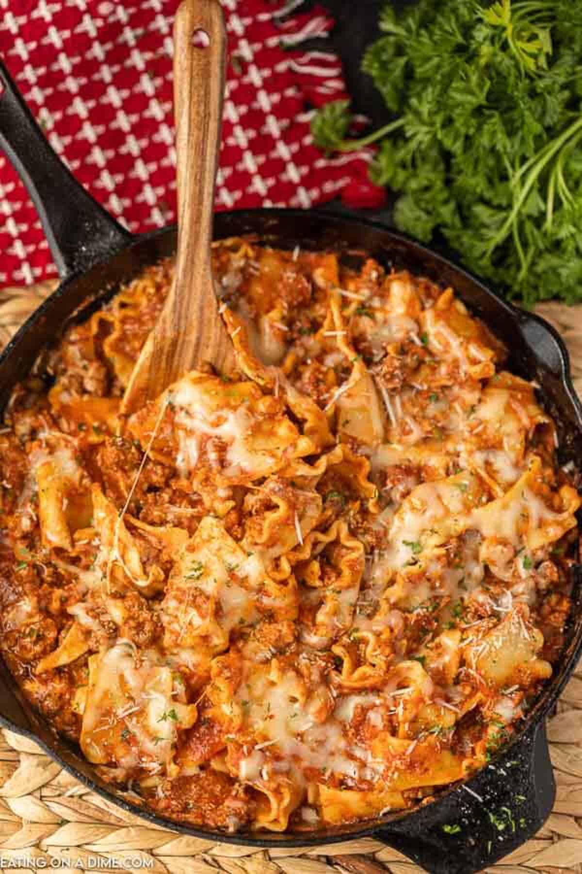 Cast iron lasagna! I'm never making it another way again. Delicious and a  new family favorite. Recipe in the comments : r/castiron