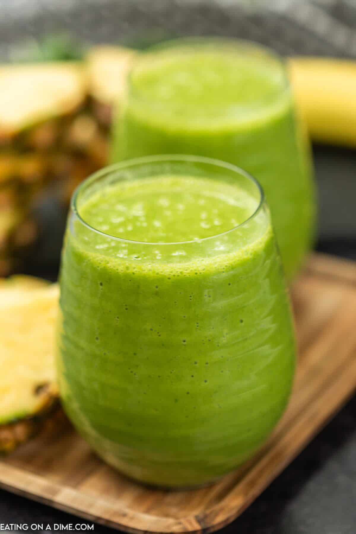 Pineapple spinach smoothie is so delicious and packs in a serving of veggies and fruit in one glass. Enjoy for breakfast, a snack or any meal. 