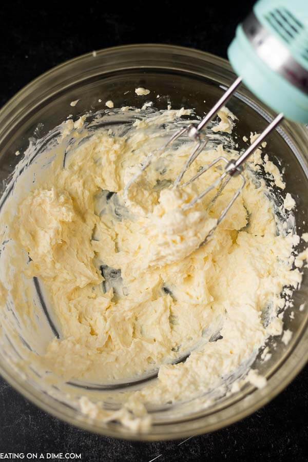 Mix cream cheese, butter and egg together in a bowl with a hand mixer