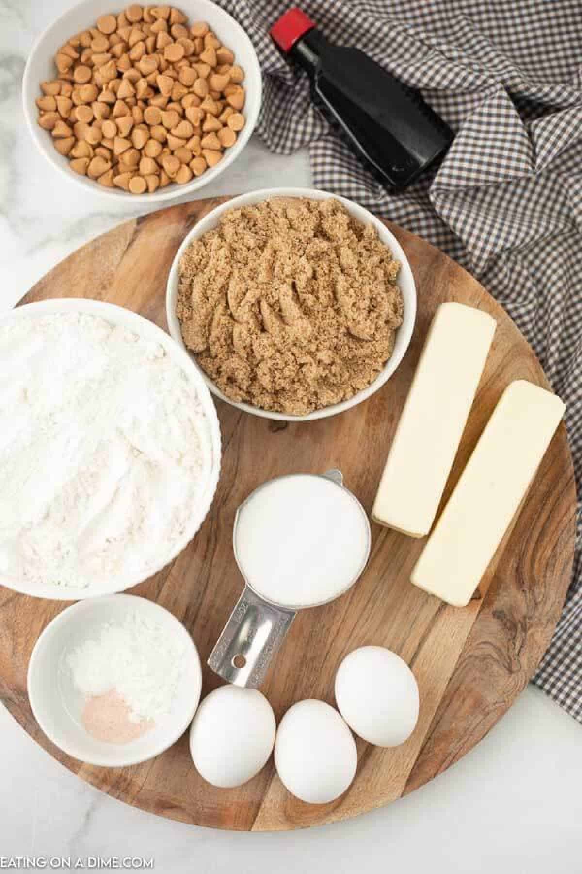 photo of ingredients - butterscotch chips, vanilla, brown sugar, granulated sugar, eggs, butter