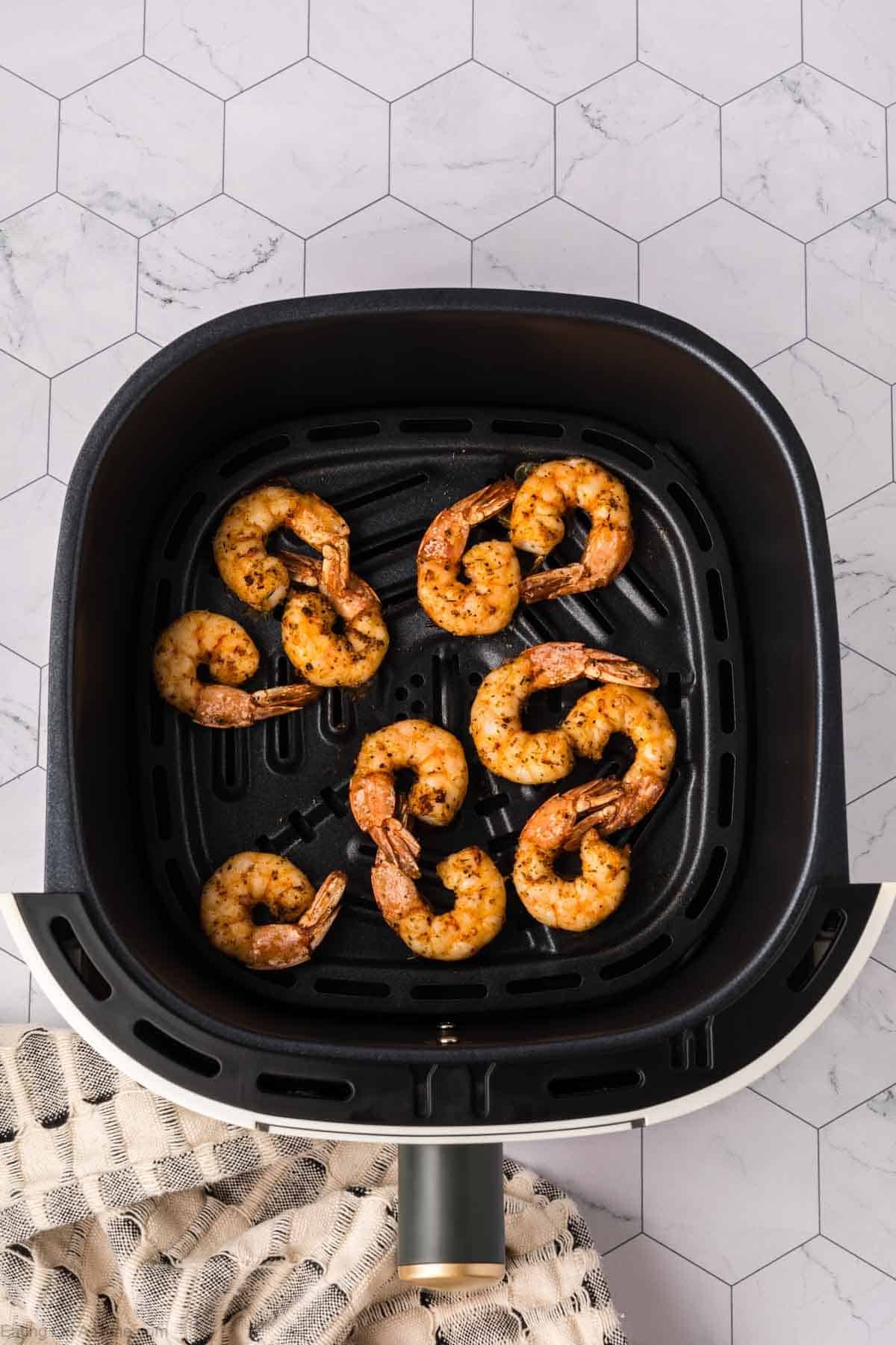 Cooked Shrimp in the air fryer basket