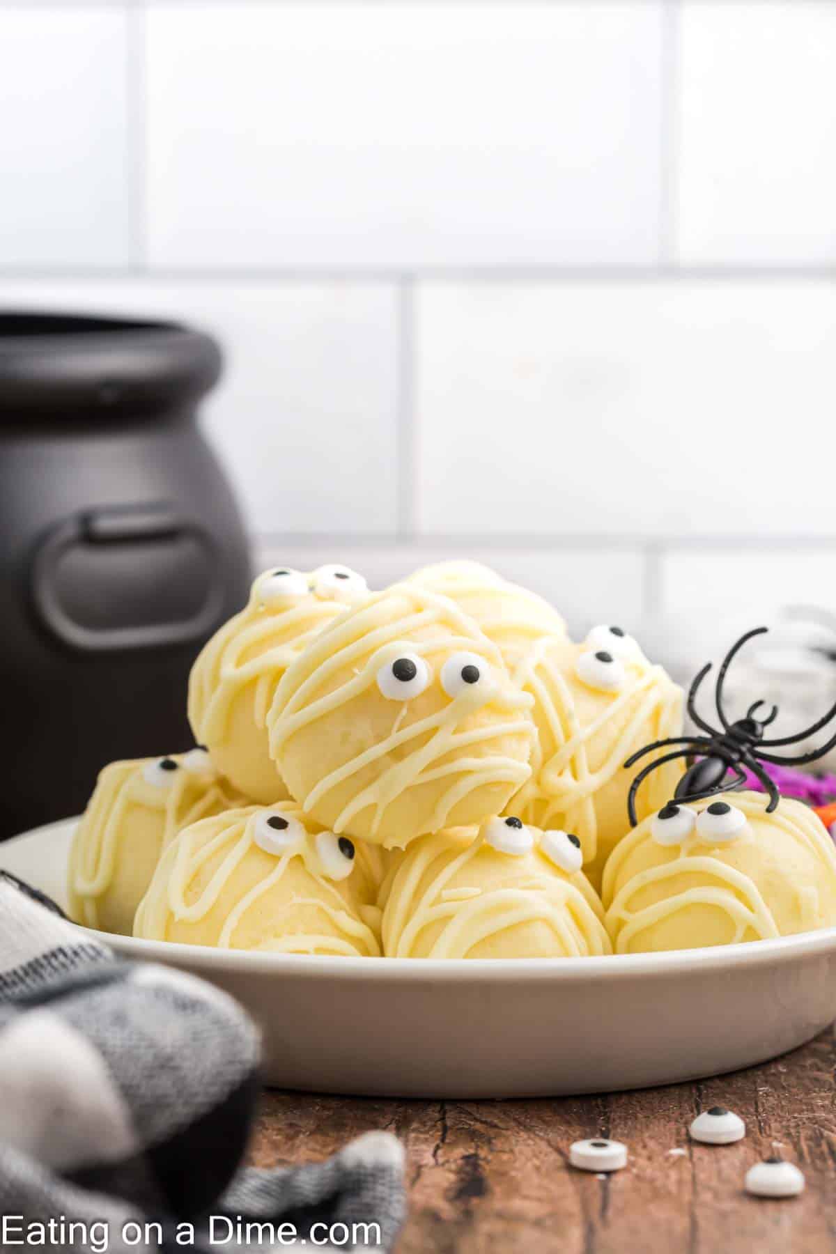 White Chocolate Mummy Truffles stacked in a bowl