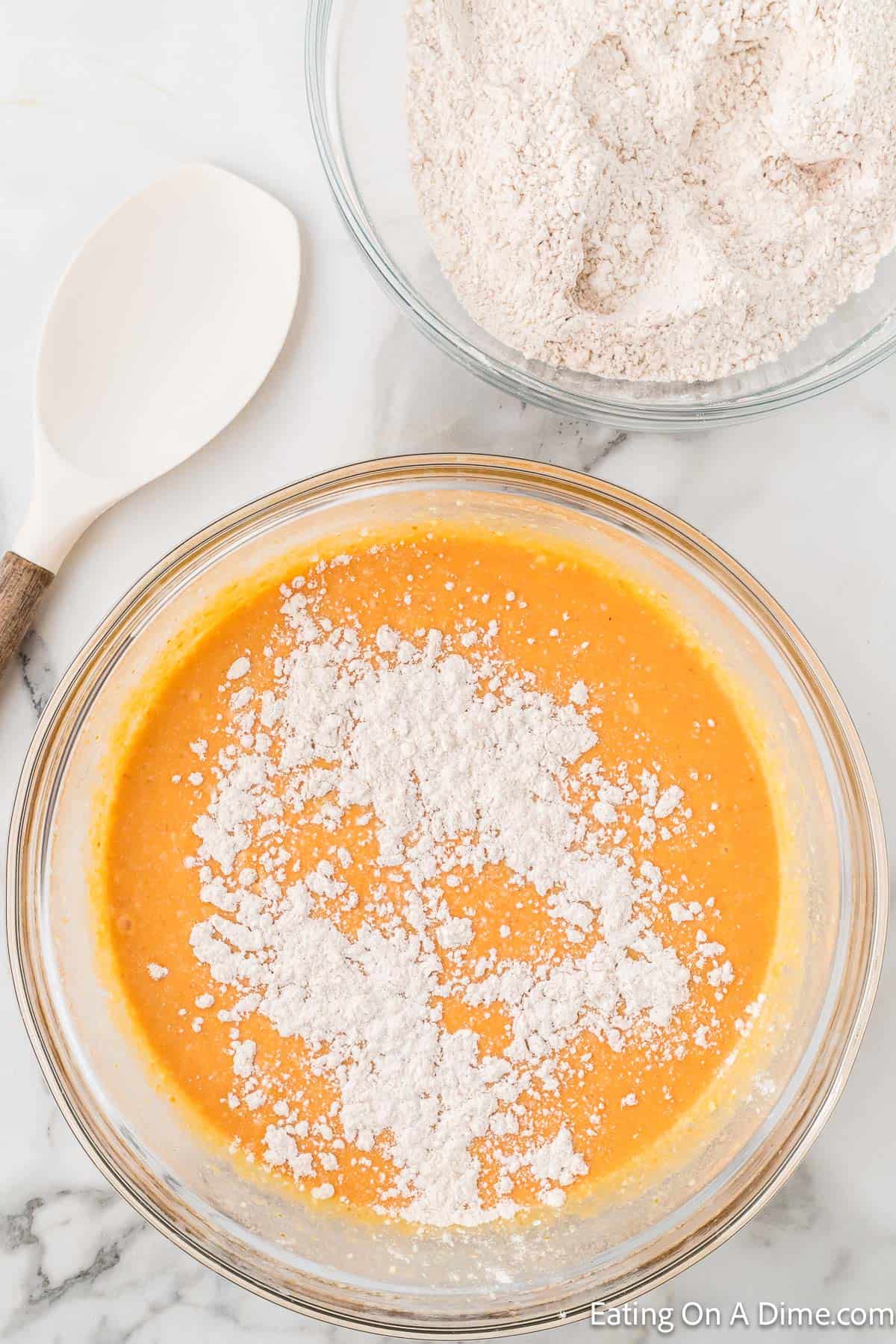 Add the flour mixture in the pumpkin batter in a bowl