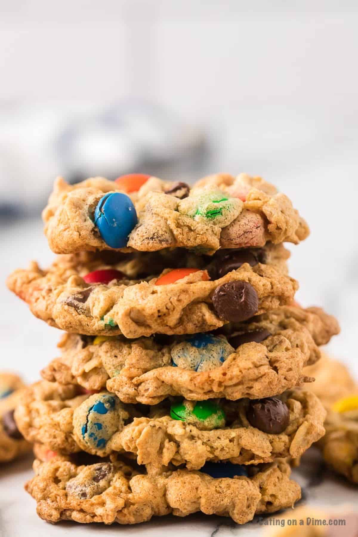 Close up image of a stack of monster cookies. 