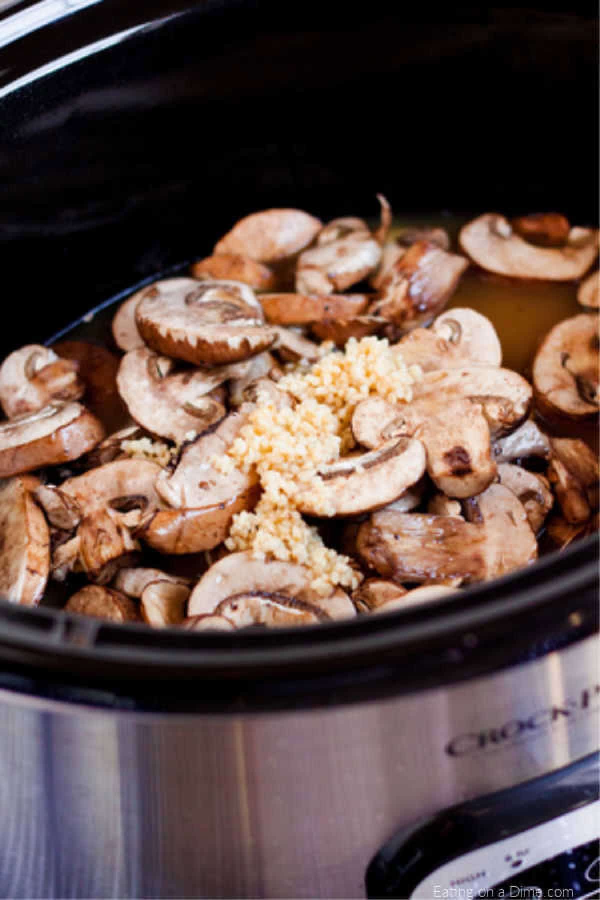 crock pot with ingredients ready to be cooked