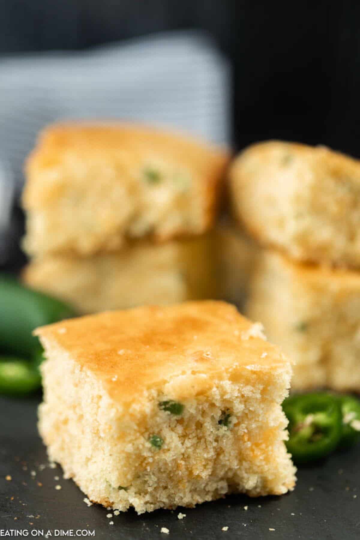 Close up image of a piece of Gluten Free Jalapeno Cheddar Cornbread. 