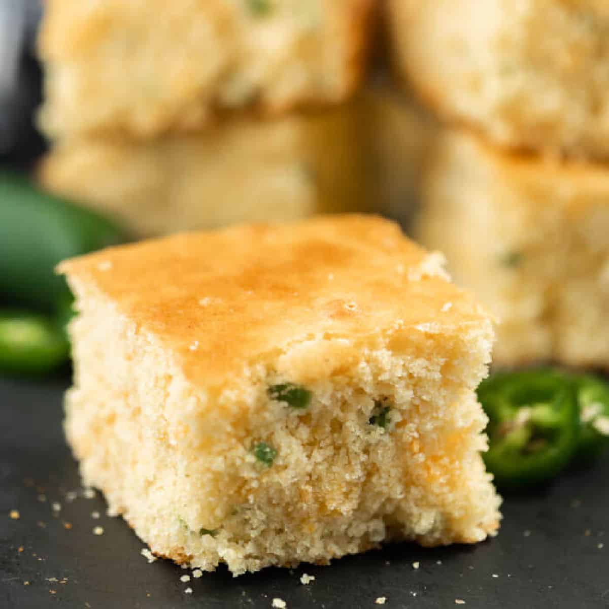 Close up image of a piece of Jalapeno Cheddar Cornbread. 