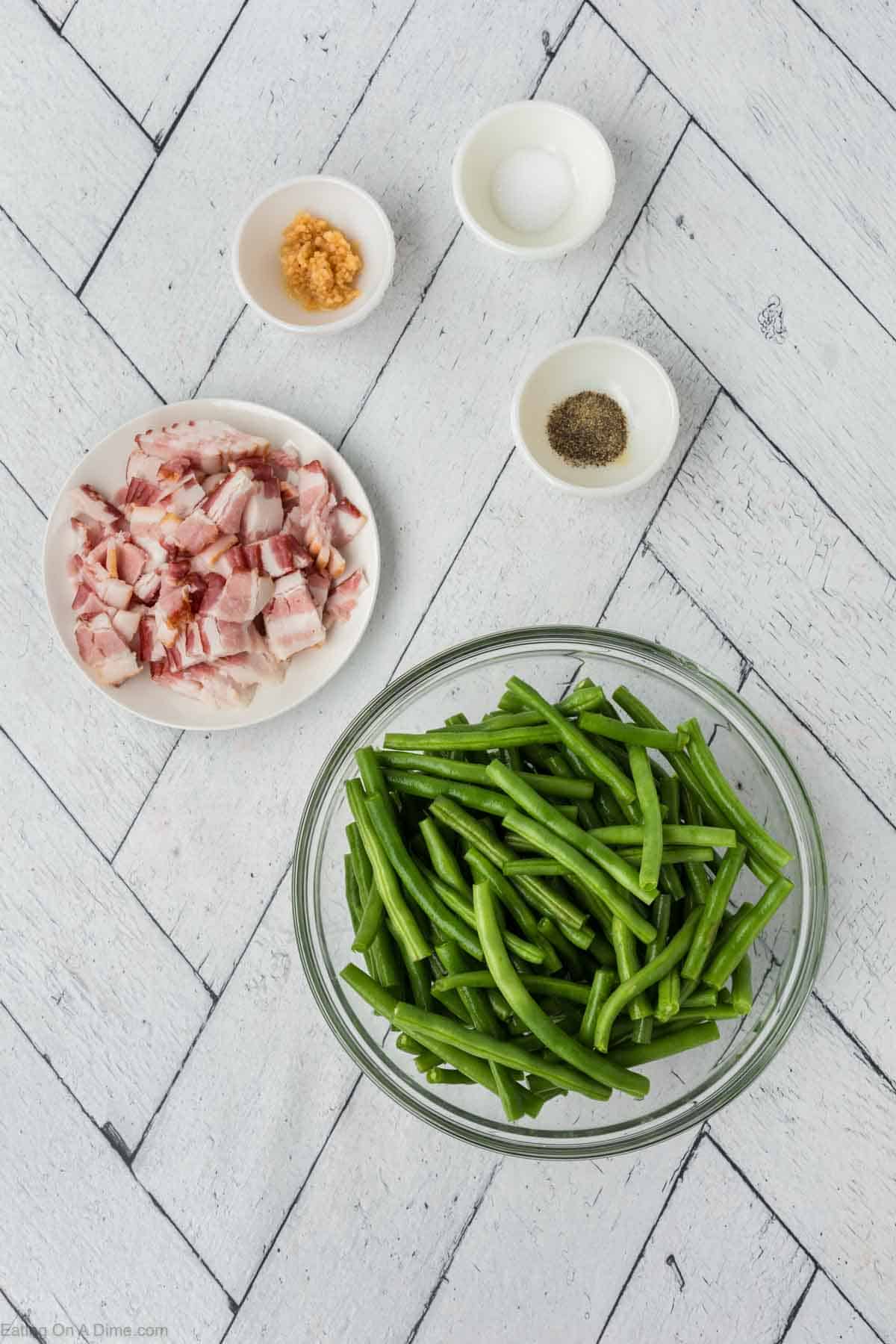 Ingredients needed - minced garlic, salt, pepper, chopped bacon and fresh green beans