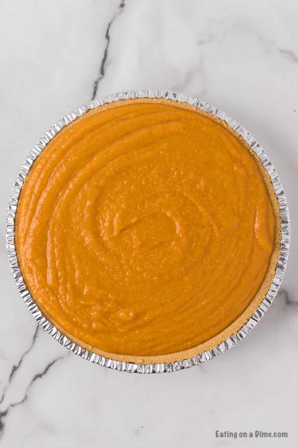 Sweet potato filling in a graham cracker crust