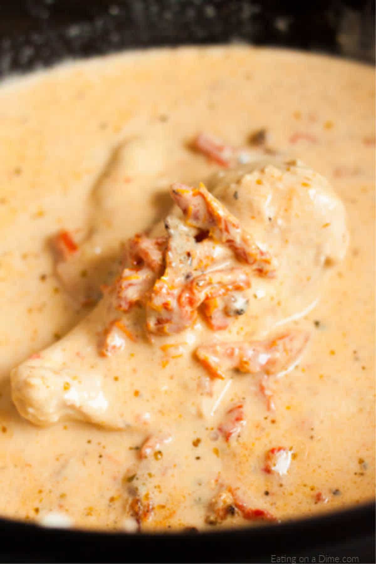 Close up image of Tuscan Chicken in the crock pot.