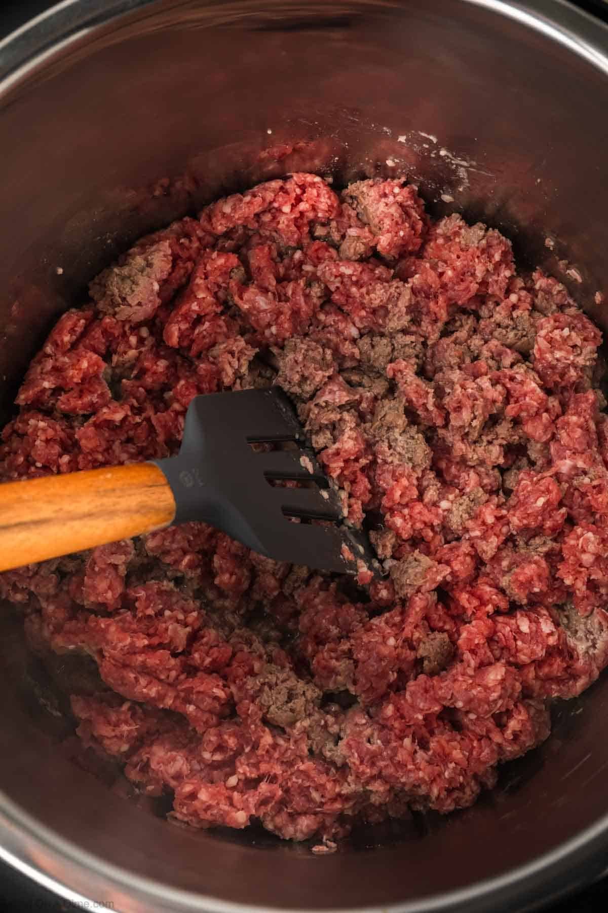 Cooking ground beef in the instant pot with a spatula