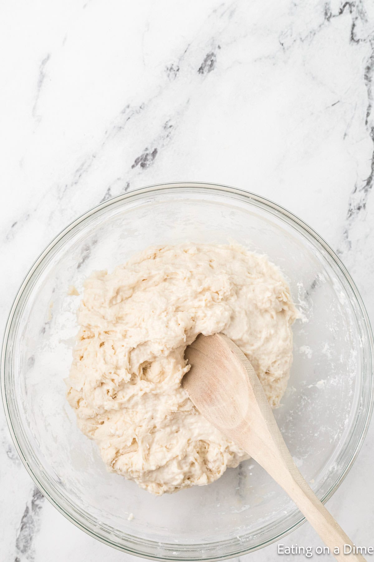 Combine dry ingredients and water in a bowl with a wooden spoon