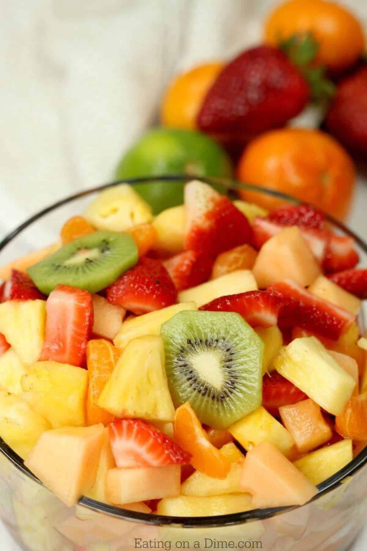 Close up image of fruit salad in a clear bowl. 