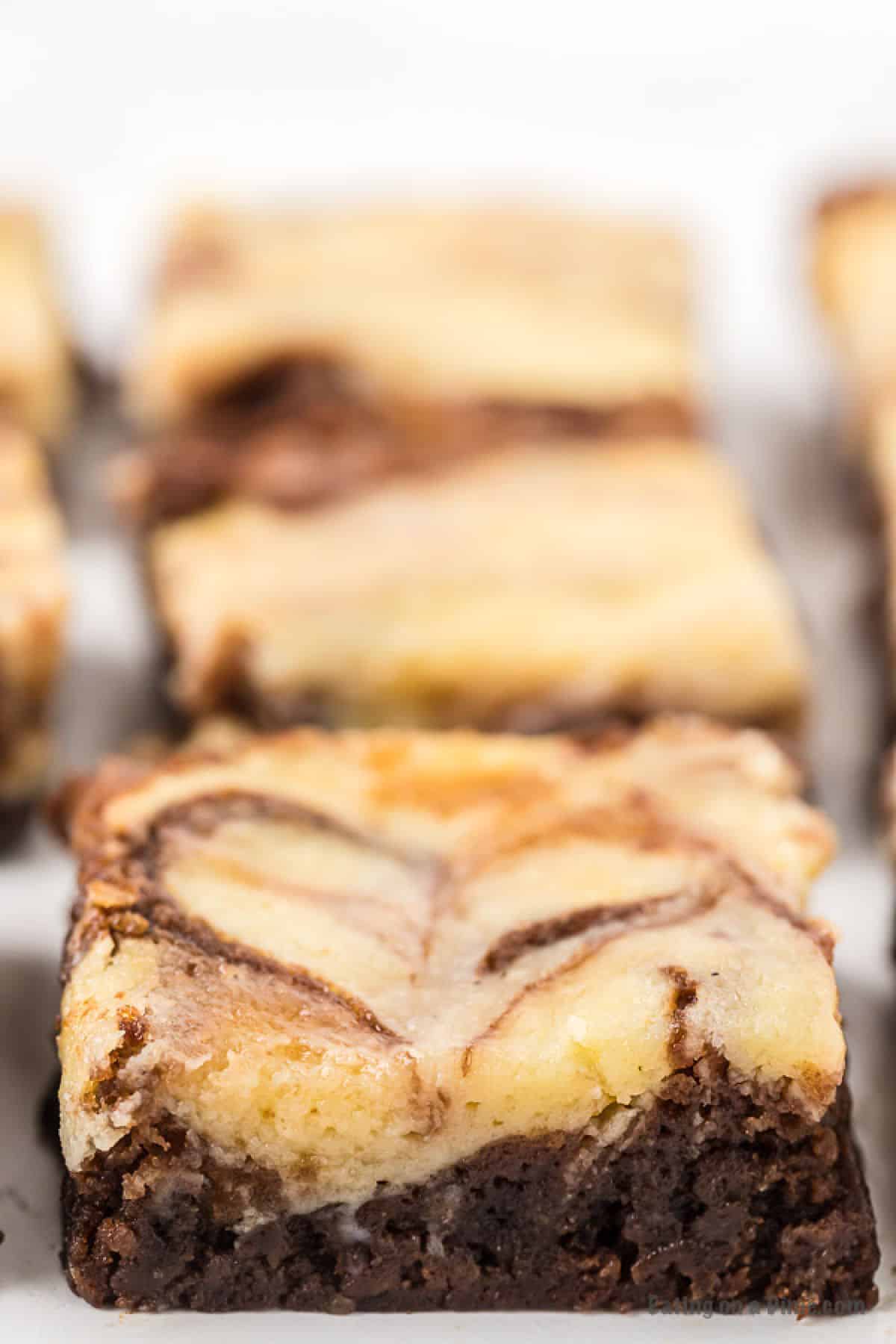 squares of cheesecake brownie. 