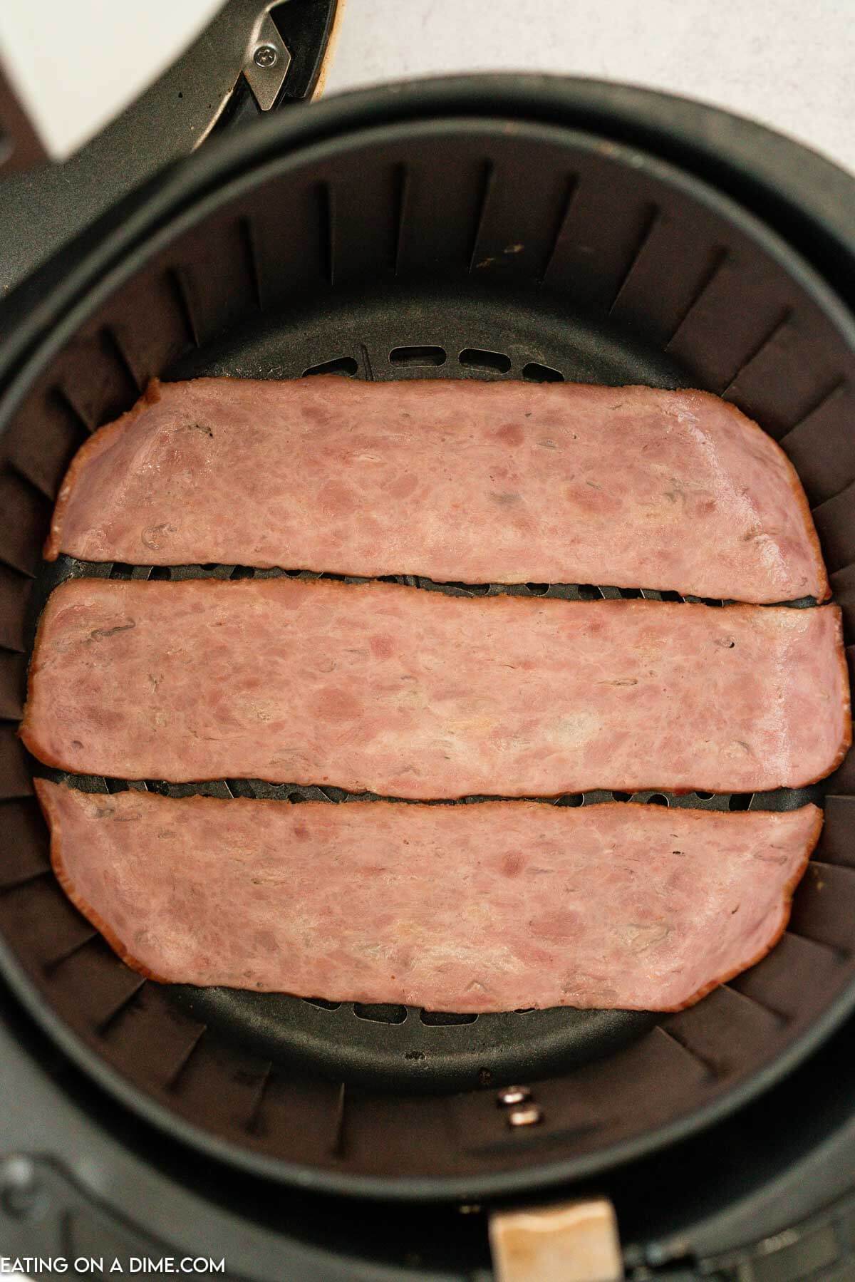 Strips of Turkey Bacon in the Air Fryer Basket