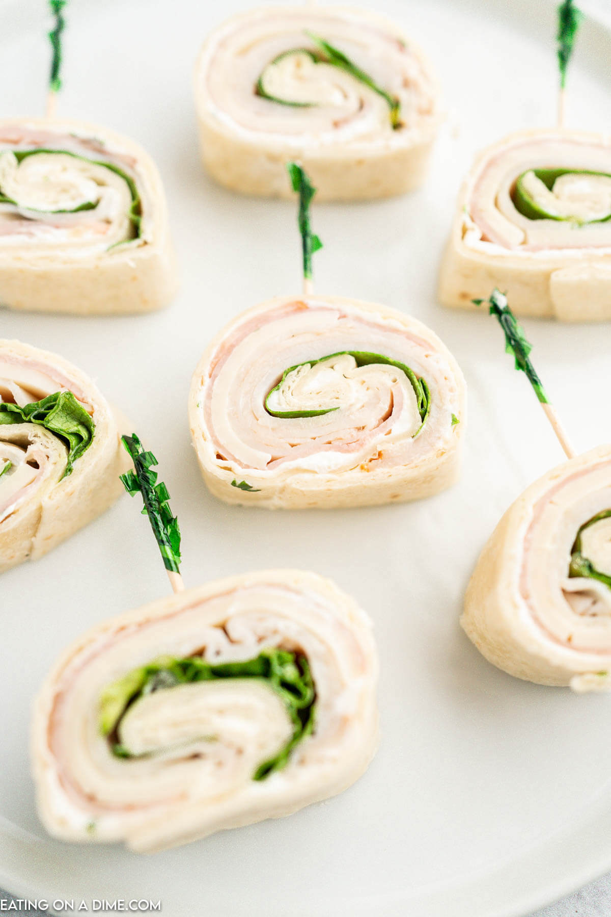 Pinwheel Sandwiches on a white platter