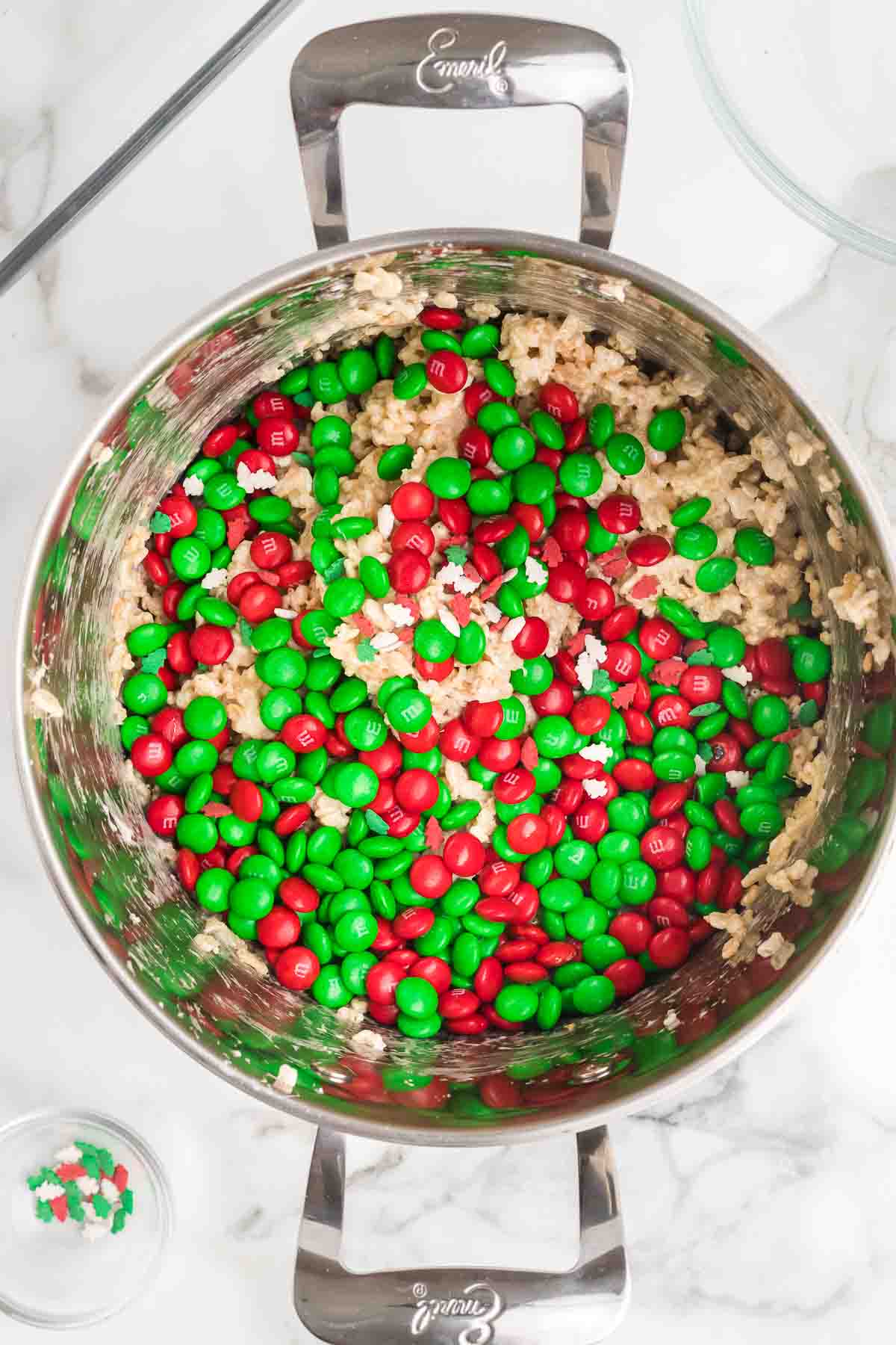 Red and Green M&M's topped the cereal mixture in a large pot