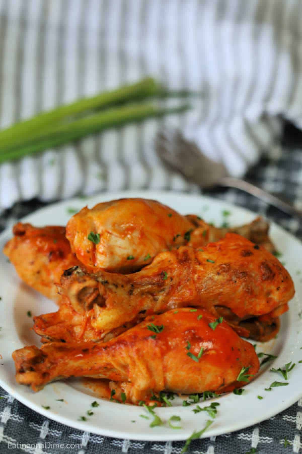 Chicken drumsticks on a plate