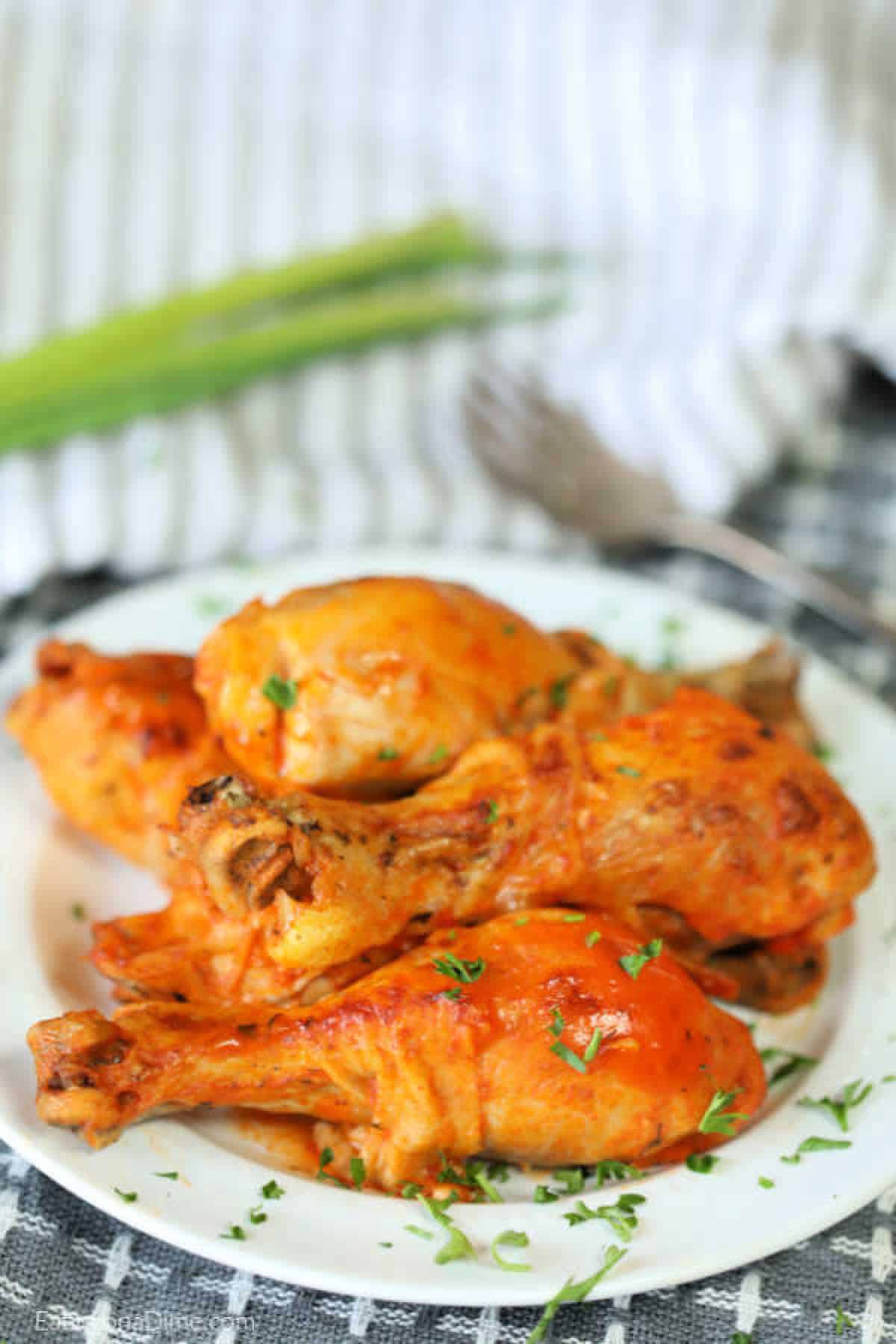 Chicken drumsticks on a plate