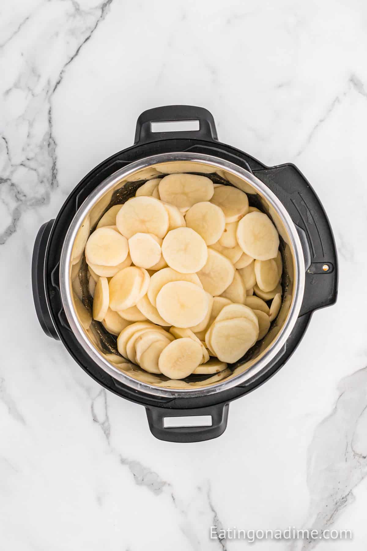 Slice potatoes in the instant pot