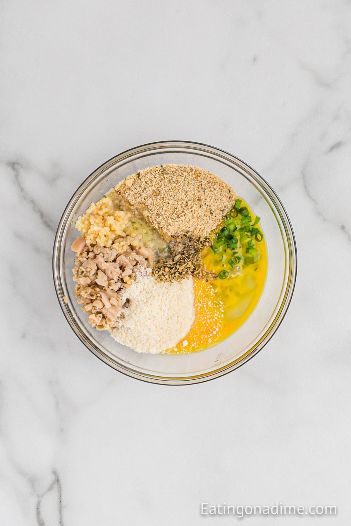 Combining the stuffing ingredients in a bowl