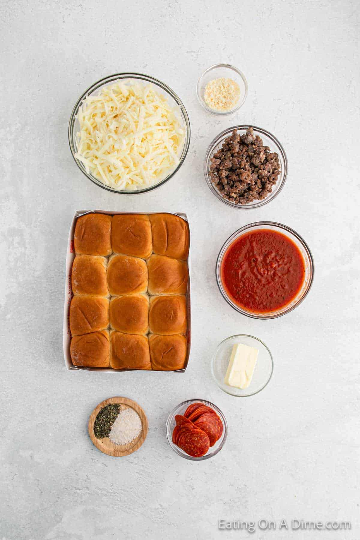 Ingredients - Hawaiian Dinner Rolls, pizza sauce, mozzarella cheese, pepperoni, ground sausage, butter, parmesan cheese, garlic salt, Italian Seasoning